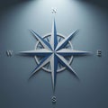 A stylized compass rose with eight points is depicted against a blue background. The Royalty Free Stock Photo