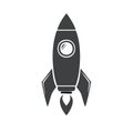 Stylized dark gray rocket ship with a circular window and flame exhaust ready for launch Royalty Free Stock Photo