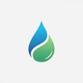 Stylized droplet logo features a blue upper half and a green lower half, divided by a white curve, Royalty Free Stock Photo