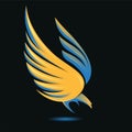 Stylized flying down bird silhouette in golden, blue, yellow and black colors. Attacking hunting Eagle image. Shining Phoenix