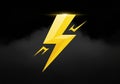 Stylized golden lightning bolt set against a dark, cloudy background. The design features sharp Royalty Free Stock Photo