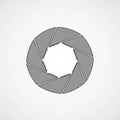 A stylized, gray camera shutter icon. The design consists of a circular arrangement Royalty Free Stock Photo