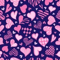 Stylized hand-drawn seamless pattern of graphic pink hearts. Vector illustration on dark blue background.