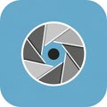 Stylized illustration of a camera aperture on a blue background featuring Royalty Free Stock Photo