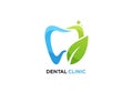 Stylized logo of a dental clinic featuring a blue and green tooth design. The blue shape forms the Royalty Free Stock Photo