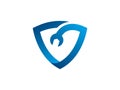 A stylized logo showcasing a wrench within a protective shield, symbolizing reliability, service, and security Royalty Free Stock Photo