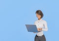 Stylized Professional Woman Using Laptop on Blue Background Royalty Free Stock Photo