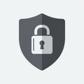 A stylized shield icon featuring a padlock symbol in the center. The shield is dark grey Royalty Free Stock Photo