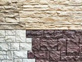 Stylized stone or brick plastic wall of different colors. Abstract Background, Texture, Pattern, frame, place for text Royalty Free Stock Photo