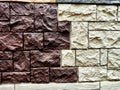 Stylized stone or brick plastic wall of different colors. Abstract Background, Texture, Pattern, frame, place for text Royalty Free Stock Photo