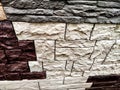 Stylized stone or brick plastic wall of different colors. Abstract Background, Texture, Pattern, frame, place for text Royalty Free Stock Photo