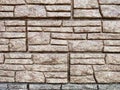 Stylized stone or brick plastic wall of different colors. Abstract Background, Texture, Pattern, frame, place for text Royalty Free Stock Photo