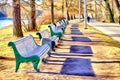 A parkway with benches in the park - stylized to painting