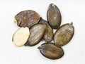 Styrian pumpkin hulless seeds close up on gray Royalty Free Stock Photo