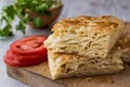 Su Boregi / Turkish Patty with greens and tomatoes.