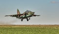 Su25 frogfoot attack aircraft close up in the sky with clouds