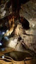 Su Mannau cave in Sardinia with stalactites' pipe organ and inner water lake Royalty Free Stock Photo