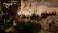 Su Mannau cave in Sardinia with stalactites' pipe organ and inner water lake Royalty Free Stock Photo