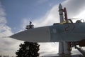 Su-27 military airplane and Vostok rocket shown at VDNKH park in Moscow.