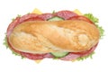 Sub deli sandwich baguette with salami top view isolated Royalty Free Stock Photo