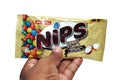 Subang Jaya, a cookies and creme with cookies bites chocolate packet brand JACK 'N JILL NIPS on white background.