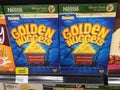 Subang Jaya, Malaysia - 20 February 2021 : NESTLE Whole Grain Golden Nuggets breakfast display for sell on the supermarket shelf
