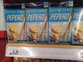 SUBANG JAYA,MALAYSIA-23 NOVEMBER 2022 : PEPERO Snowy Almond biscuits stick box display for sell on the supermarket shelf