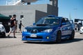 Subaru Impreza second generation Hawkeye blue with black hood