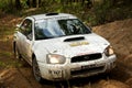 Subaru Impreza WRC racing in forest