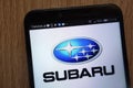 Subaru logo displayed on a modern smartphone