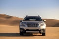 Subaru Outback standing in the middle of the desert. Namibia