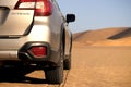 Subaru Outback standing in the middle of the Namib desert. Namibia. Africa