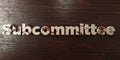 Subcommittee - grungy wooden headline on Maple - 3D rendered royalty free stock image Royalty Free Stock Photo