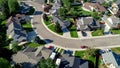 Subdivision filled with houses and a curved street in urban America Royalty Free Stock Photo