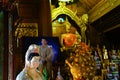 Subdued light inside Buddhist Temple