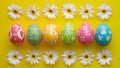 Subject Colorful Easter eggs with spring flowers, top view background Royalty Free Stock Photo