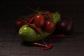 Close-up of zucchini, cherry tomatoes, chili peppers and red onions. Royalty Free Stock Photo