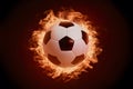 Subject Soccer ball surrounded by fiery flames in dramatic illumination Royalty Free Stock Photo