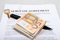 Sublease agreement with Euro notes key and pen Royalty Free Stock Photo