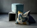 sublime flutter of a batik upholstered cushion with a concrete overtone. Podium, empty showcase for packaging product