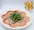 Sublime quality beef carpaccio dish Royalty Free Stock Photo