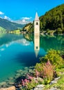 Submerged Bell Tower of Curon on Lake Reschen in South Tyrol, Italy Royalty Free Stock Photo