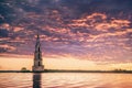 Submerged bell tower in river beautiful sunrise