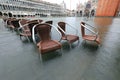 submerged chairs in Saint Mark Square in Venice Italy Royalty Free Stock Photo