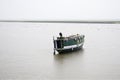 Submerged fishing boat on River Assam in India Royalty Free Stock Photo