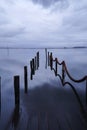 Submerged pier at blue hour on winter