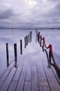 Submerged pier at blue hour on winter