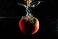 Submerged red apple