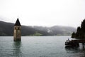 Submerged tower of reschensee church deep in Resias Lake Royalty Free Stock Photo