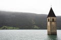 Submerged tower of reschensee church deep in Resias Lake Royalty Free Stock Photo